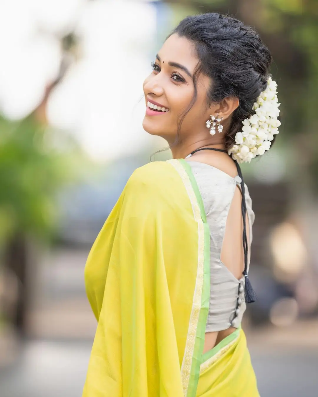 Priya Bhavani Shankar Wearing Beautiful Earrings Jewellery Green Saree